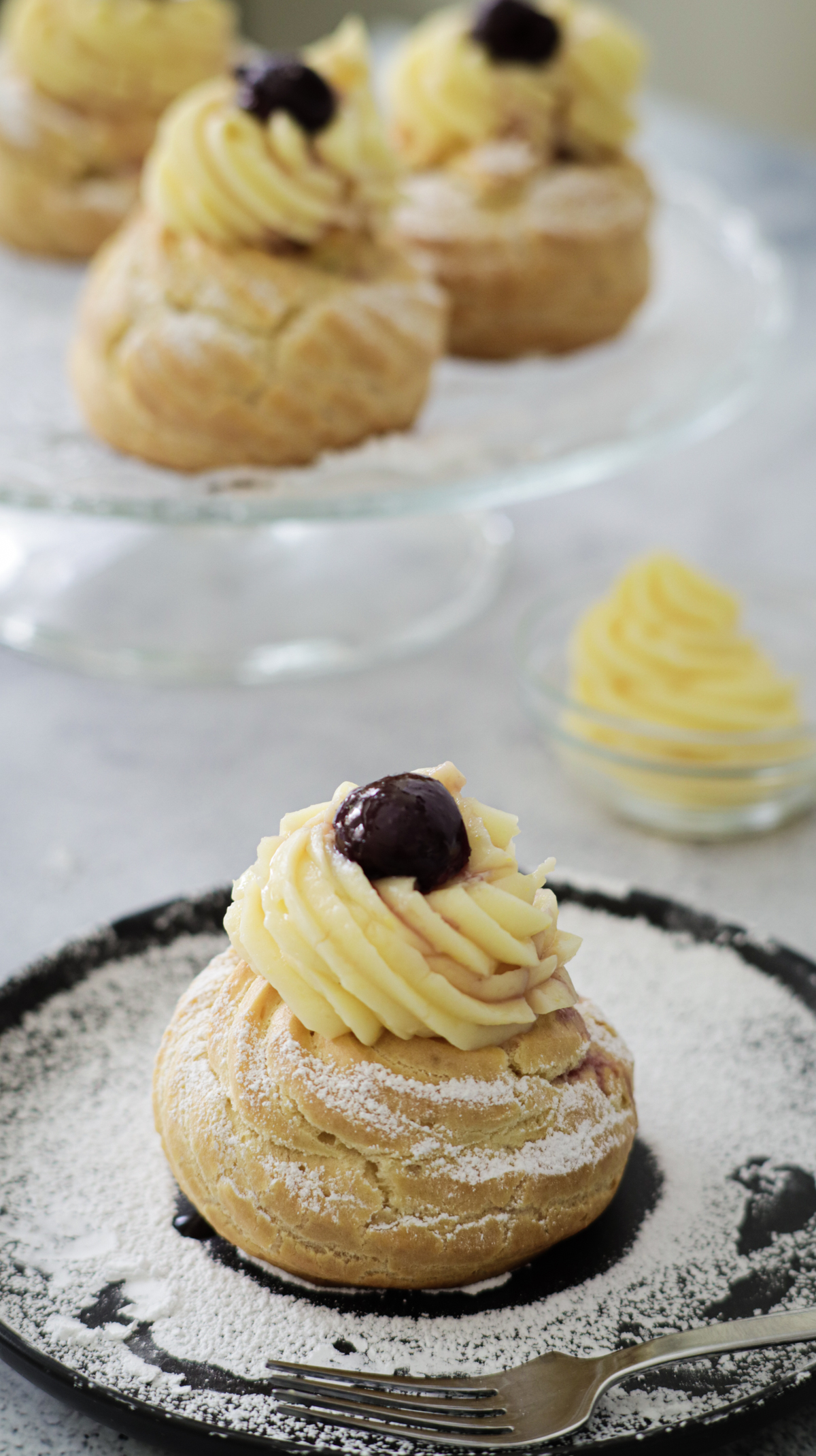 st Joseph pastry ready to be served. On background more pastry on a dish.