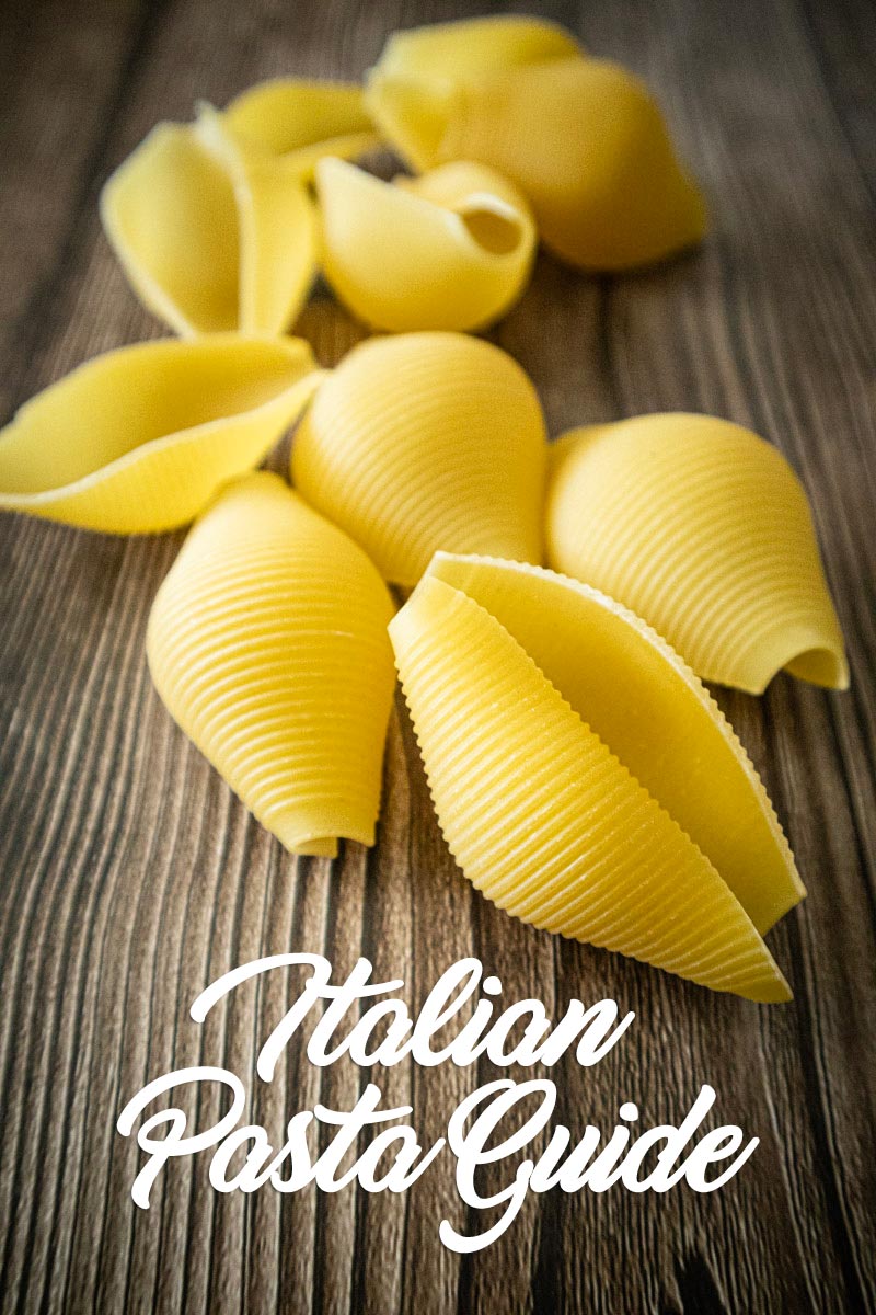 Pasta shell on a wood board.