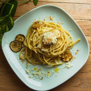 Pasta with fried zucchini and grated ricotta salata